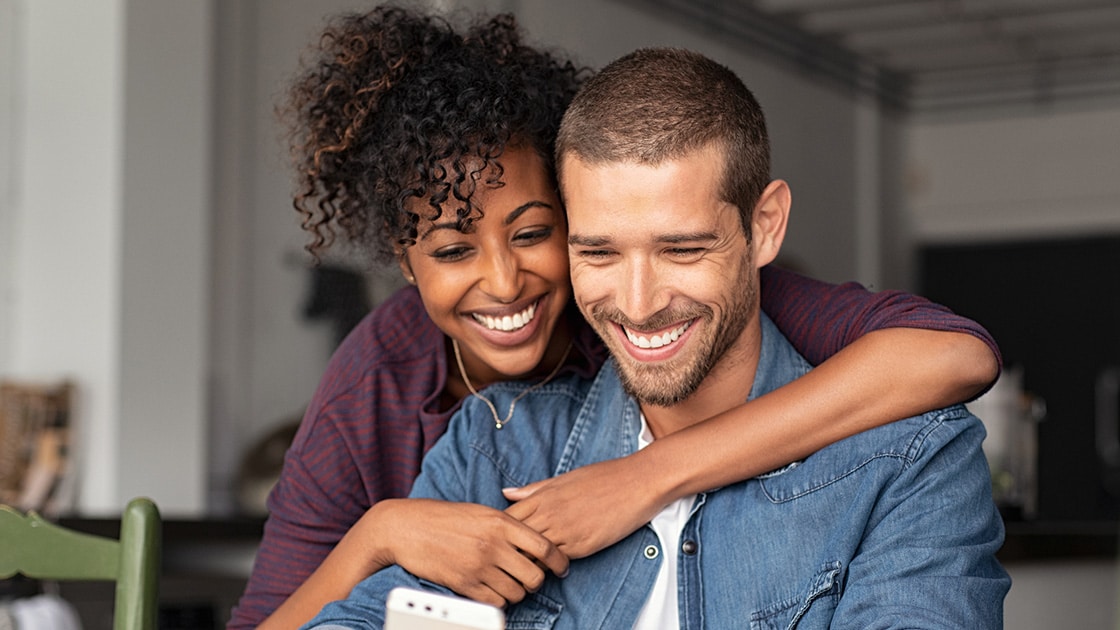 Couple looking at phone